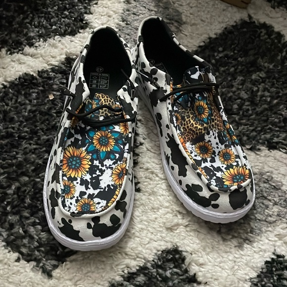 Hey dudes, cow print with cheetah print and sunflower’s on them. - Picture 1 of 1